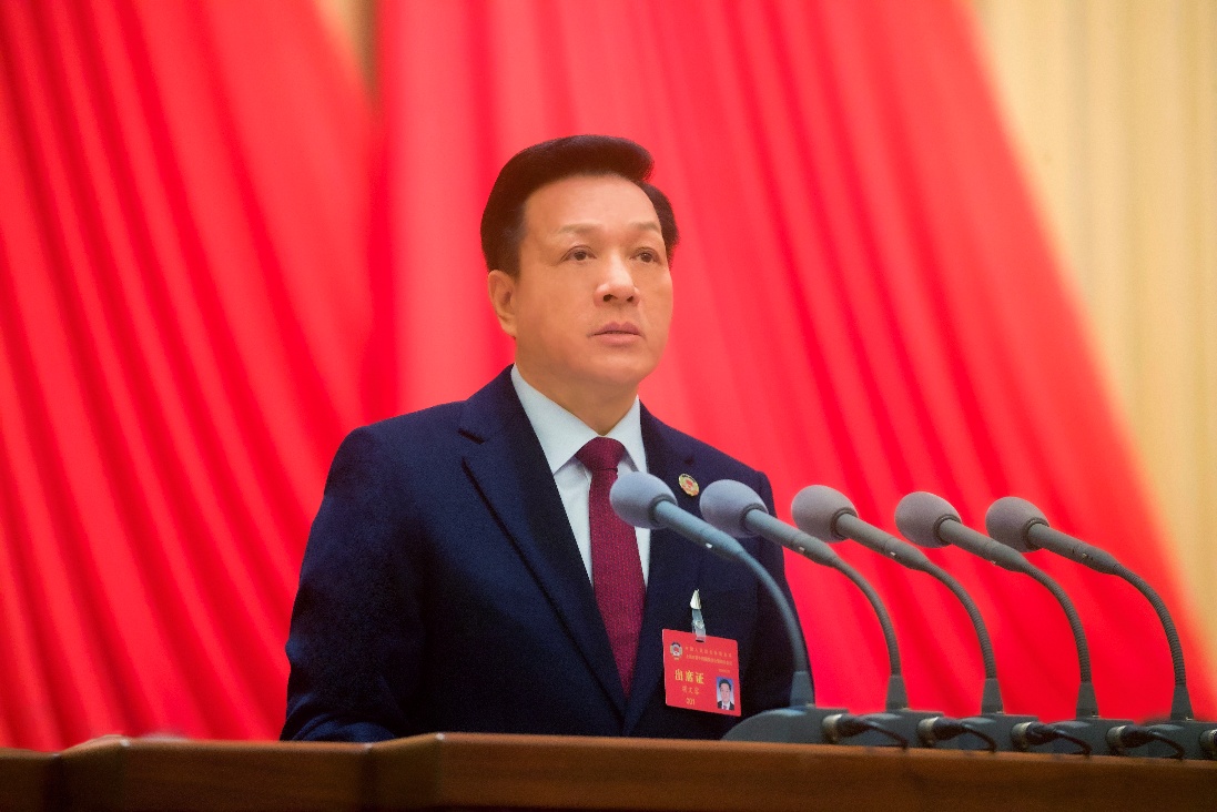 胡文容作工作报告。张海峰摄